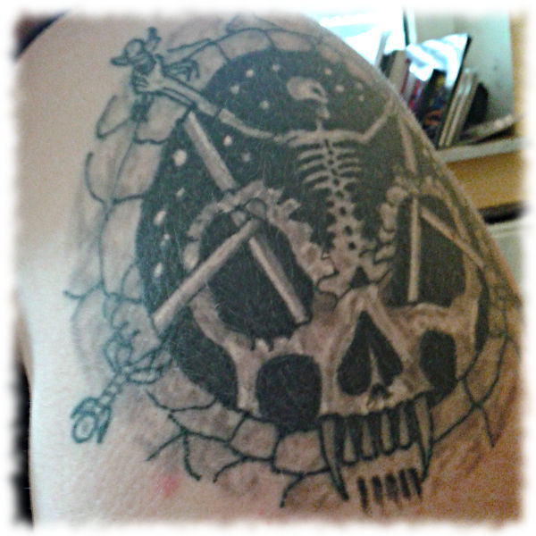 Tatto mit Motiv von Slayer.