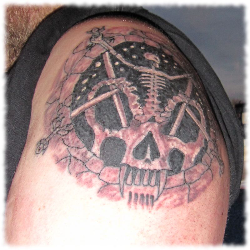 Tattoo: Motiv Slayer.